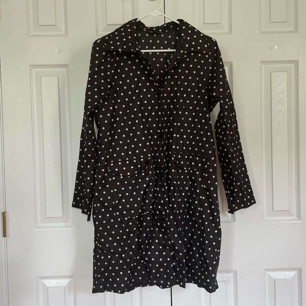 Black and white polka dot packable rain jacket